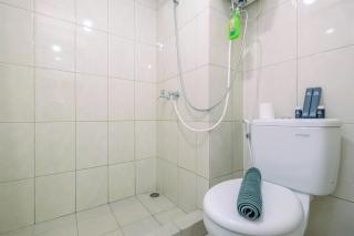 Elegant and Nice Studio at Springlake Summarecon Apartment By Travelio - Bekasi - 6