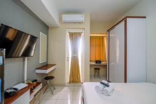 Elegant and Nice Studio at Springlake Summarecon Apartment By Travelio - Bekasi - 8