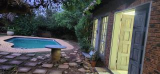 Poolside Suit at the Well - 1