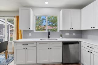 Modern family-friendly home with garage, yard - 1