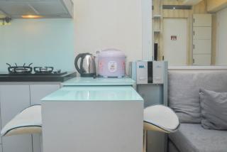 Minimalist and Warm 2BR at Bassura City Apartment By Travelio - 1