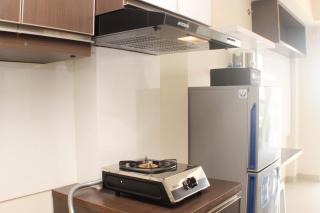 Nice and Elegant Studio Apartment at Mustika Golf Residence By Travelio - Bekasi - 1