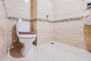 Warm and Simply Look Studio Apartment at B Residence By Travelio - 9