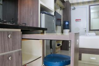 Cozy and Enjoy Studio Room at Green Pramuka City Apartment By Travelio - 3