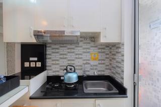 Comfort and Warm 2BR at Bassura City Apartment By Travelio - 4