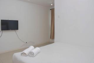 Cozy and Strategic Studio at Bassura City Apartment By Travelio - 9