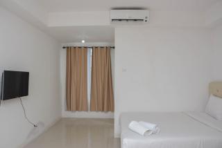Cozy and Strategic Studio at Bassura City Apartment By Travelio - 8