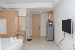Cozy and Strategic Studio at Bassura City Apartment By Travelio - 6