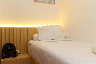 Comfort 2BR Apartment at Meikarta Apartment By Travelio - 9