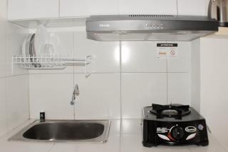 Comfy and Tidy Studio at Riverview Jababeka Apartment By Travelio - 2