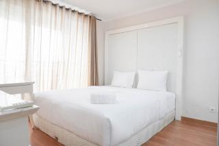 Comfort 2BR at Green Central City Glodok Apartment By Travelio - 9