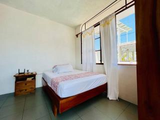 Suite con acceso a terraza vista a la Bahia - Puerto Ayora - 1