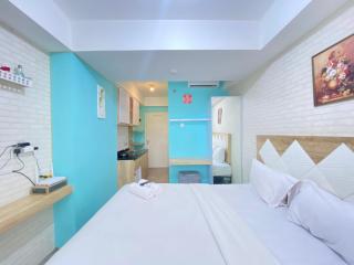 Modern and Comfy Studio Room at Grand Asia Afrika Apartment By Travelio - 3