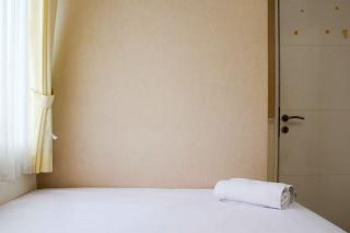 Minimalist and Warm 2BR Bassura City Apartment By Travelio - 5