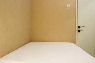 Minimalist and Warm 2BR Bassura City Apartment By Travelio - Jacarta - 7