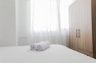 Brand New and Homey 2BR Meikarta Apartment By Travelio - Bekasi - 1