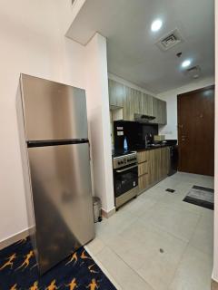 Room with Kitchen Furnished Apartments by oima leasing property - Dubai - 4