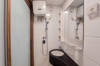 Simply and Cozy Studio at Sky House BSD Apartment By Travelio - Tangerang - 2
