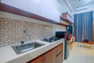 Homey and Comfort Living Studio Room at Dave Apartment By Travelio - Depok - 3
