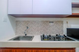 Homey and Comfort Living Studio Room at Dave Apartment By Travelio - Depok - 2