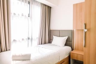 Cozy and Elegant with Pool View 2BR Apartment at M-Town Residence By Travelio - 7