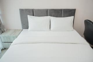 Minimalist and Nice Studio at Tree Park City Cikokol Apartment By Travelio - 9