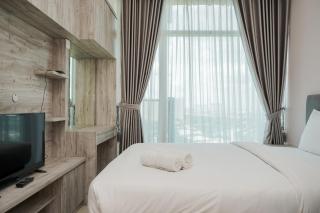 Minimalist and Nice Studio at Tree Park City Cikokol Apartment By Travelio - 8