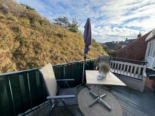 Vakantiehuisje aan Zee met Dakterras Rust en Strand 250 m - 9