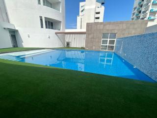 Vista a Playa con Alberca en Blvd principal frente al Mar 3hab - 4