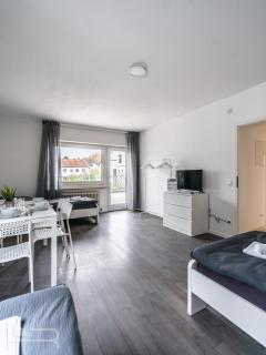 Voll ausgestattete Apartments mit Einzelbetten - Küche - WLAN - PKW-Parkplatz - 2