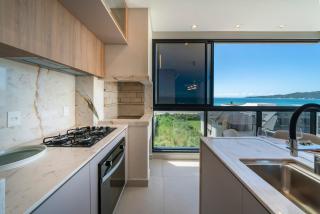 Residencial East Wind 202 - Excelente apartamento 3 Suítes, frente para o mar, piscina, sauna e espaço de lazer com vista para a praia de Mariscal - (Consultar serviços de roupa de cama e banho) - Bombinhas - 5