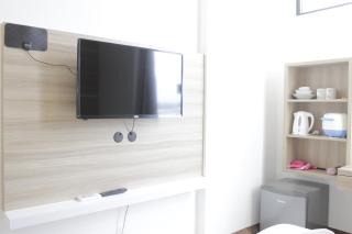Studio No Kitchen Apartment The Lodge Paskal near BINUS University By Travelio - Bandung - 5