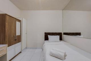 Comfy Studio Apartment No Kitchen at Aeropolis Residence near Soetta By Travelio - 6