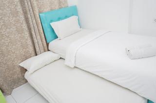 Simply 1BR at Casa De Parco Apartment By Travelio - 8