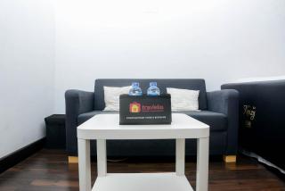 Fully Furnished with Cozy Design Studio Bassura City Apartment By Travelio - 8