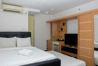 Fully Furnished with Cozy Design Studio Bassura City Apartment By Travelio - 4