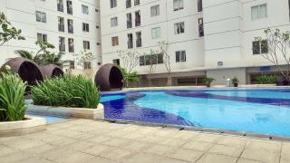 Fully Furnished with Cozy Design Studio Bassura City Apartment By Travelio - 5