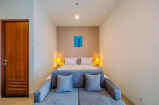 Cozy and Great Choice Studio at Grand Kamala Lagoon Apartment By Travelio - Bekasi - 8