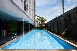 Trendy and Tidy Studio Room at Puri Mas Apartment By Travelio - Surabaya - 5