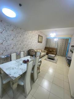 Luxury 2 bedroom next to beach with swimming pool gym and kids play area - Ajman - 1