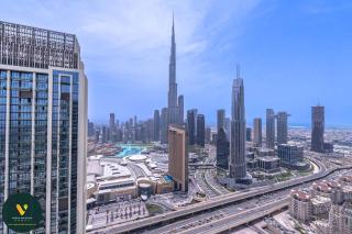 DOWNTOWN VIEWS II - VOGUE Luxurious Two-Bedroom Apartment with Balcony and Full Burj Khalifa, Opposite Dubai Mall Skybridge - 0