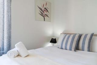 Breezy Coastal Townhouse near Park & Shops - 1