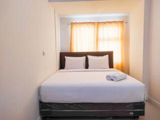 Luxurious 1BR at Vida View Makassar Apartment By Travelio - Pampang - 0