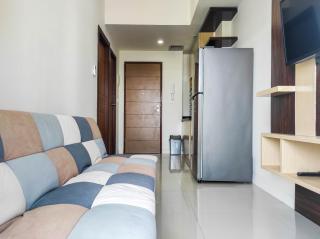Luxurious 1BR at Vida View Makassar Apartment By Travelio - Pampang - 4