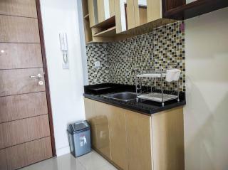 Luxurious 1BR at Vida View Makassar Apartment By Travelio - Pampang - 6
