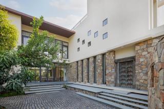 SaffronStays Camelot by the Lake - 3BR villa with glass walls, TT, projector, and gardens, Udaipur - 6