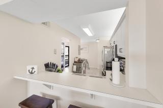 Condo with pool, view of Clam Bay and walk to beach - 2