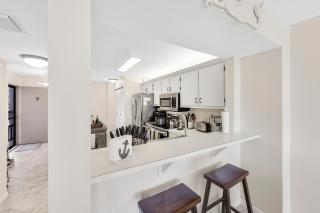 Condo with pool, view of Clam Bay and walk to beach - 1