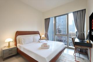 Livbnb-Prestige 1BR in Grande, Pool with Iconic Burj Khalifa View - 9