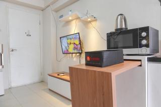 Elegant and Comfy 2BR above Mall at Bassura City Apartment By Travelio - Jakarta - 1